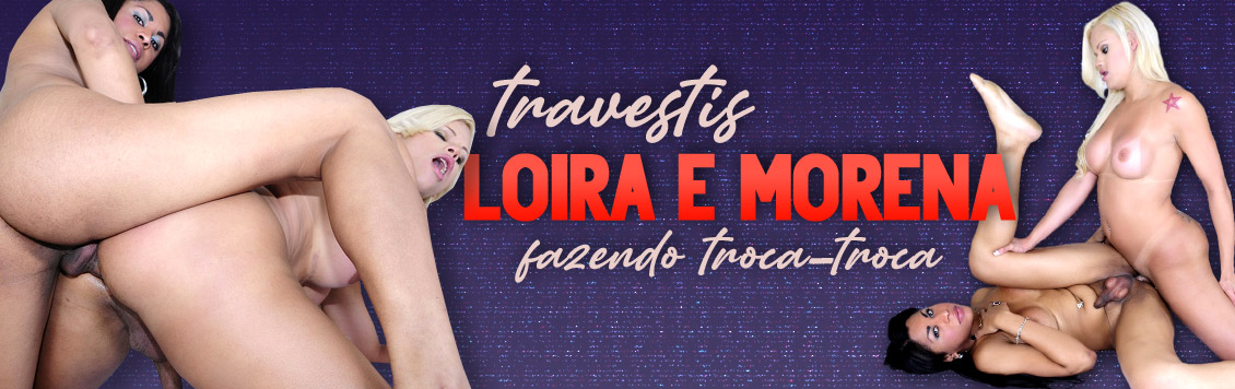 Travestis loira e morena fazendo troca troca